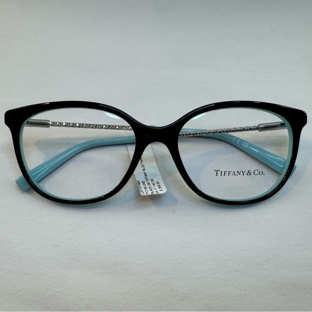 Tiffany TF2168
Black on Tiffany Blue
Size: 54-17-140
Women’s Eye Glasses
